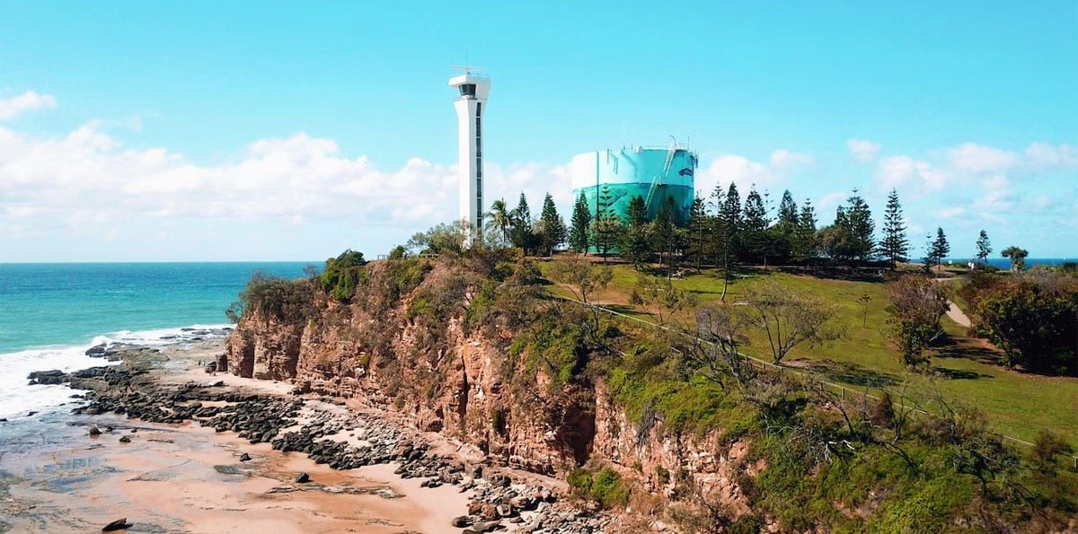 Aerial Drone View of the Point Cartwright Lighthouse on the Sunshine Coast, Queensland, Australia — Quantum Buyers Agents Property In Bowen Hills, QLD