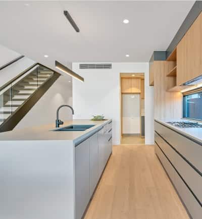 Modern Seamless Kitchen Design — Quantum Buyers Agents Property In Bowen Hills, QLD Interior Of Minimalist Kitchen Design — Quantum Buyers Agents Property In Bowen Hills, QLD